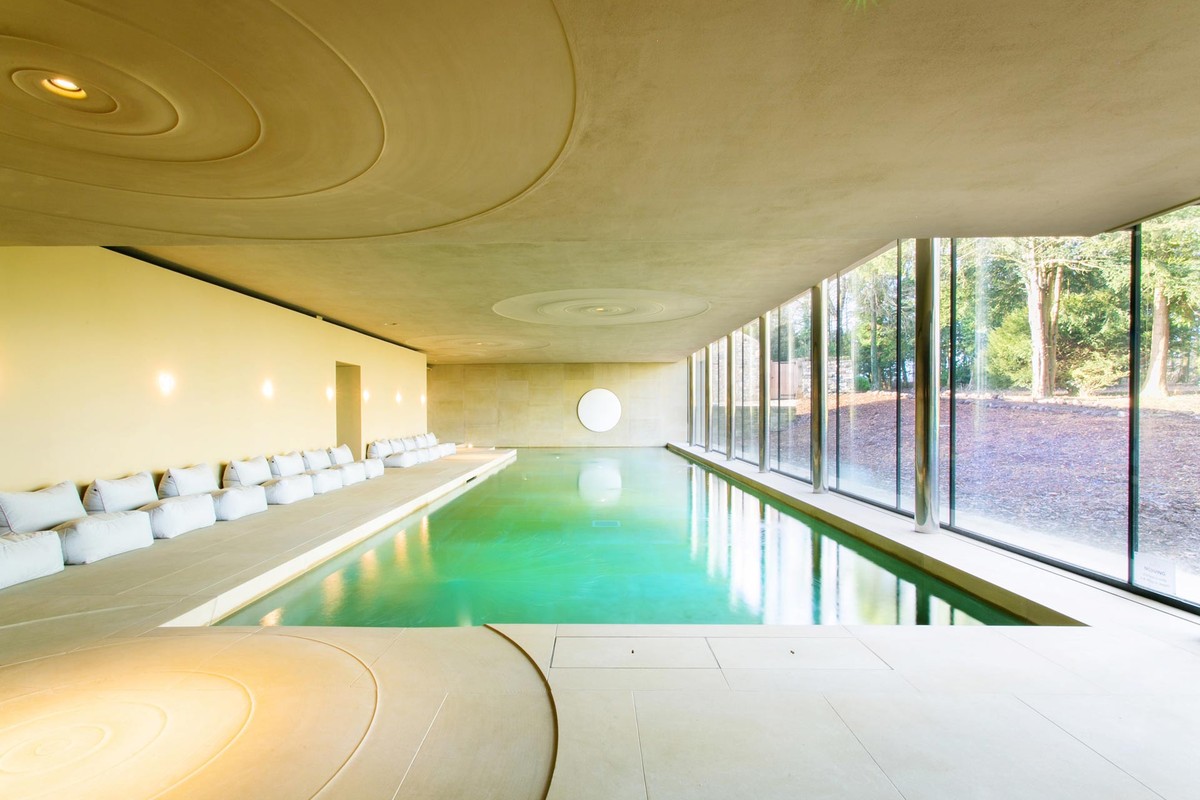 Indoor pool under a vaulted plaster ceiling
