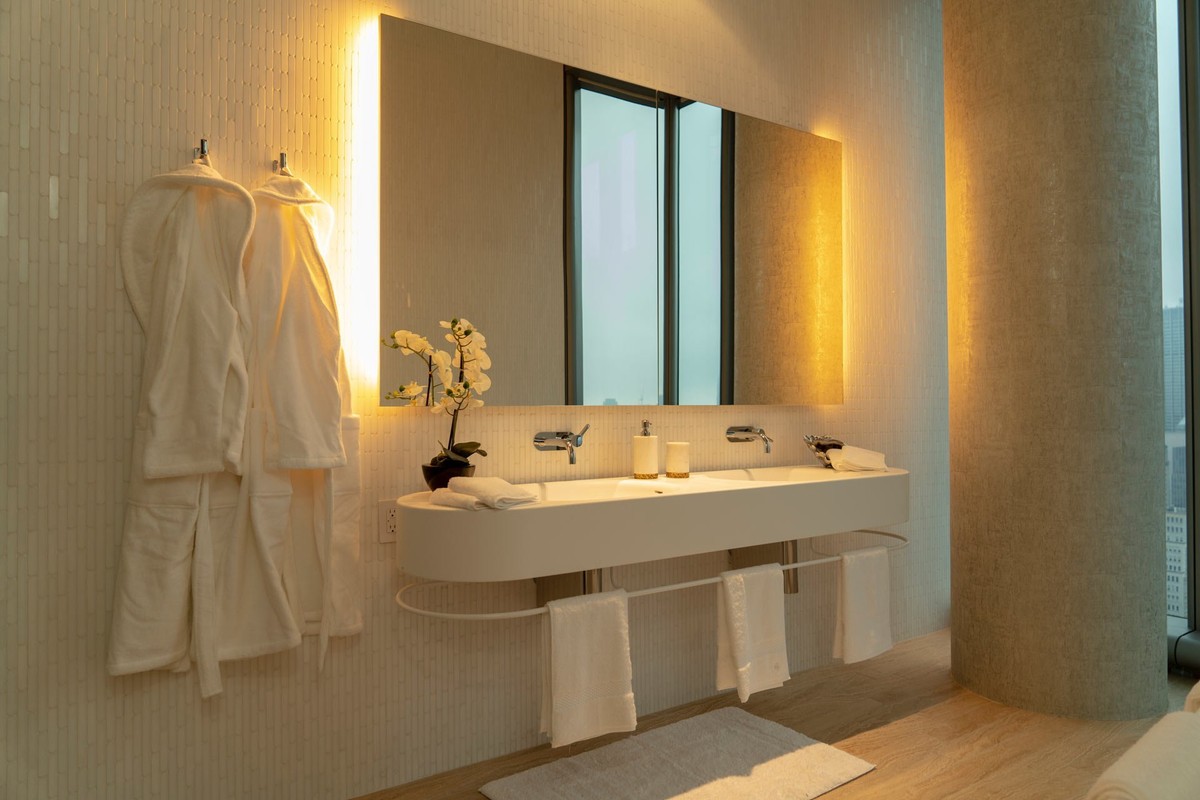 Bathroom with curved walls and indirect lighting