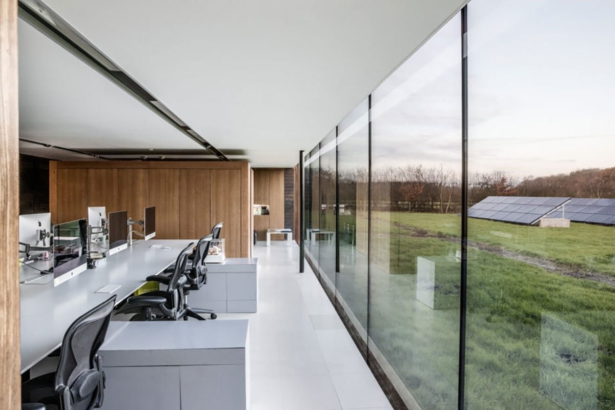 Glazed open-plan office facing the countryside