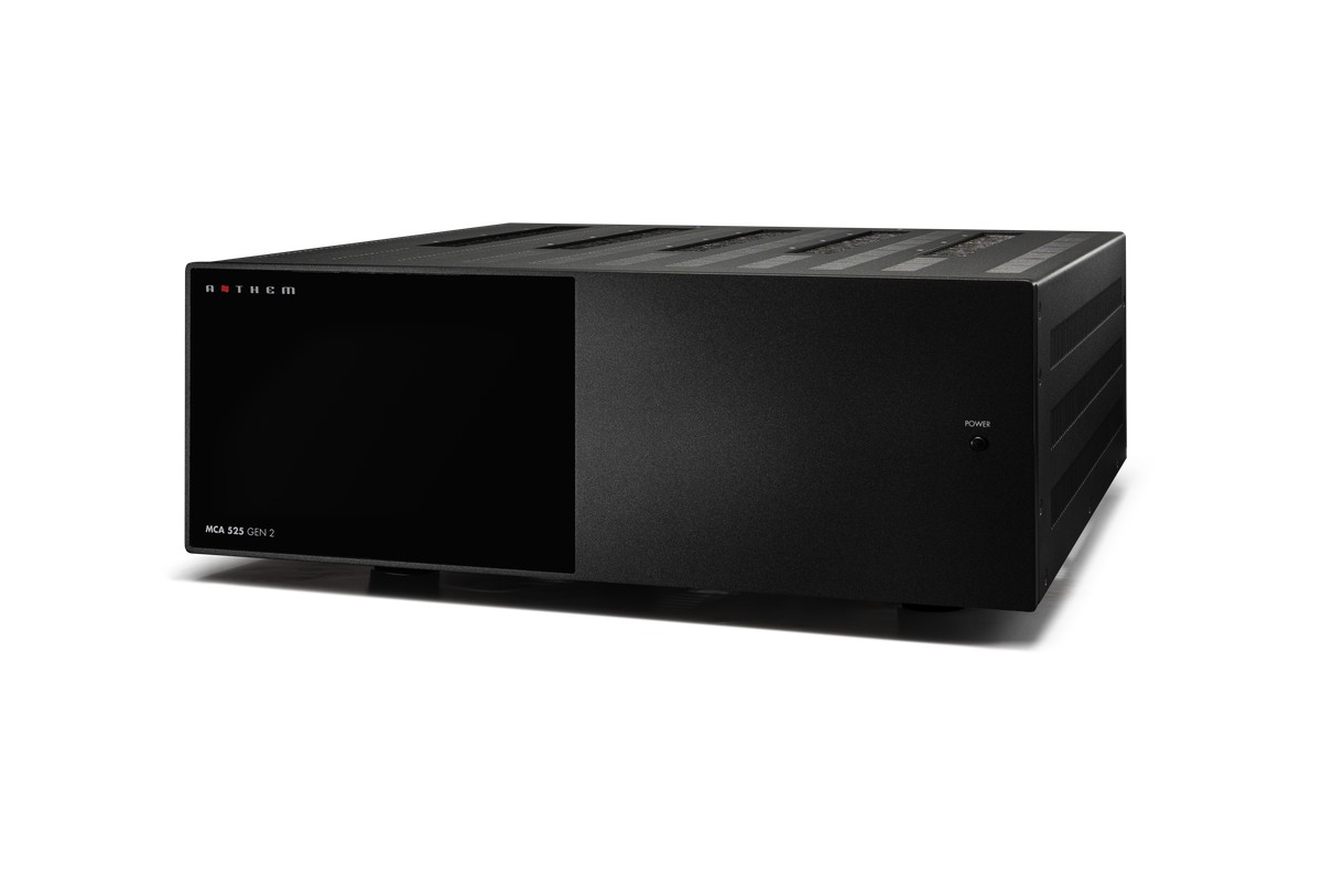Power amplifier seen from the front three-quarter, black front panel