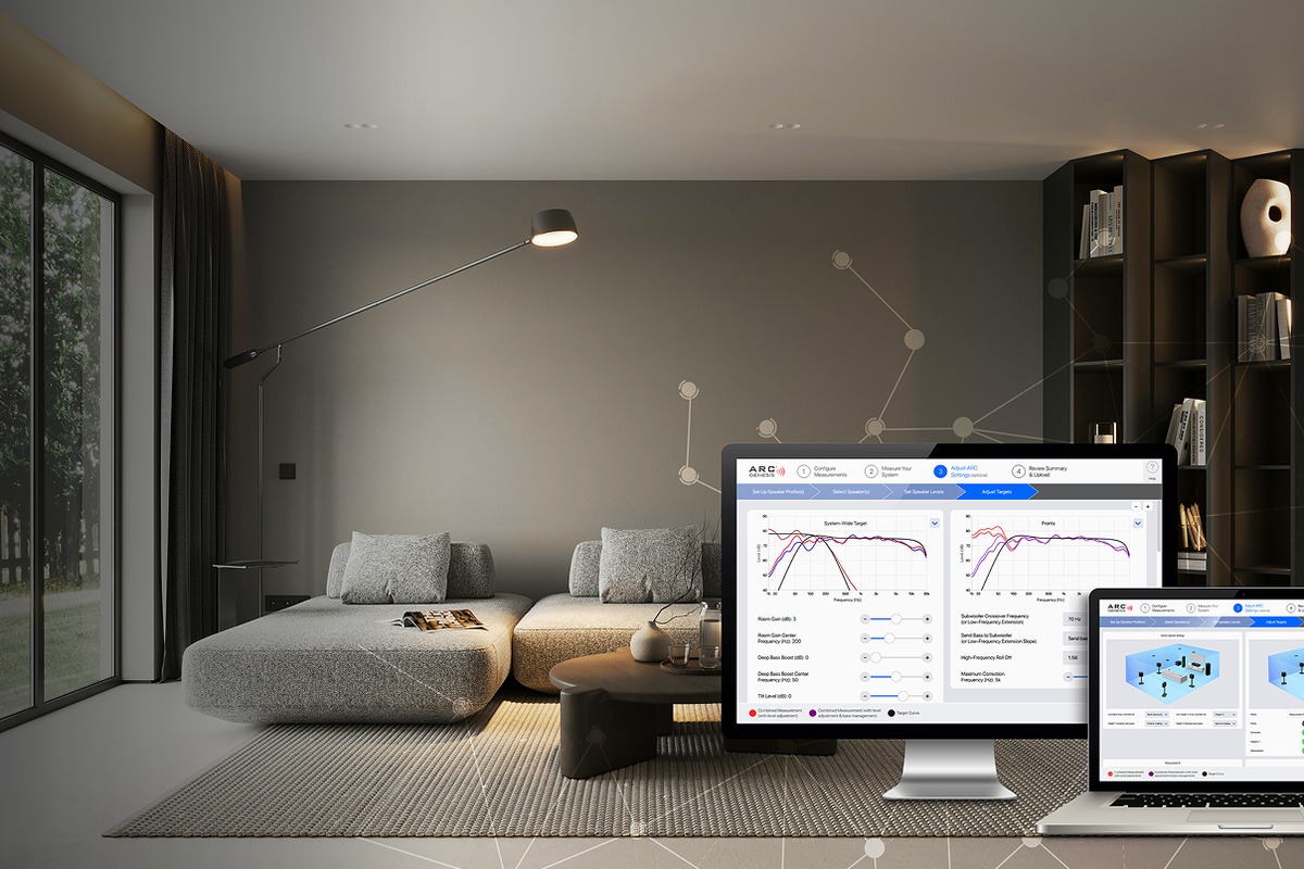 Modern living room with a screen and a laptop showing the room correction software