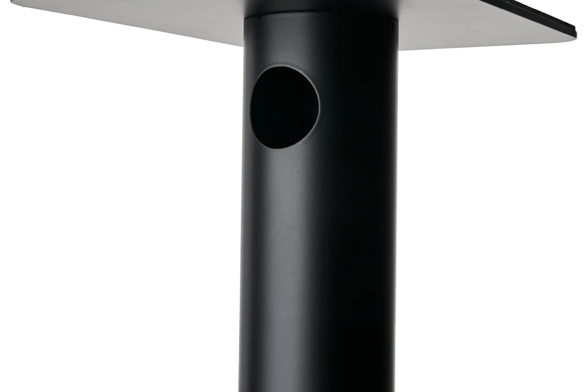 Top of the black column with the cable opening below the plate