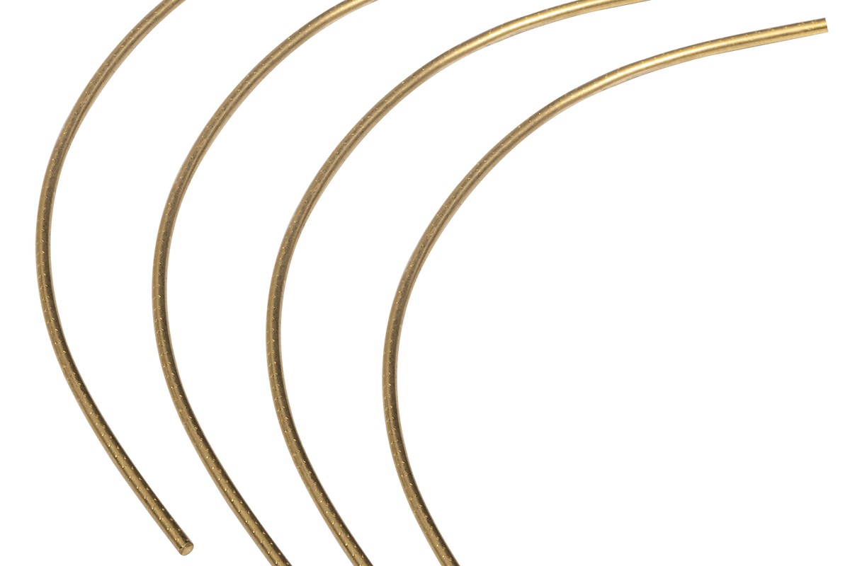Curved gold copper wires side by side