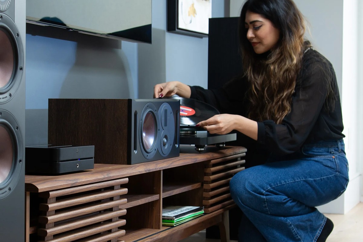Listening system set up in a living room, started from a low cabinet