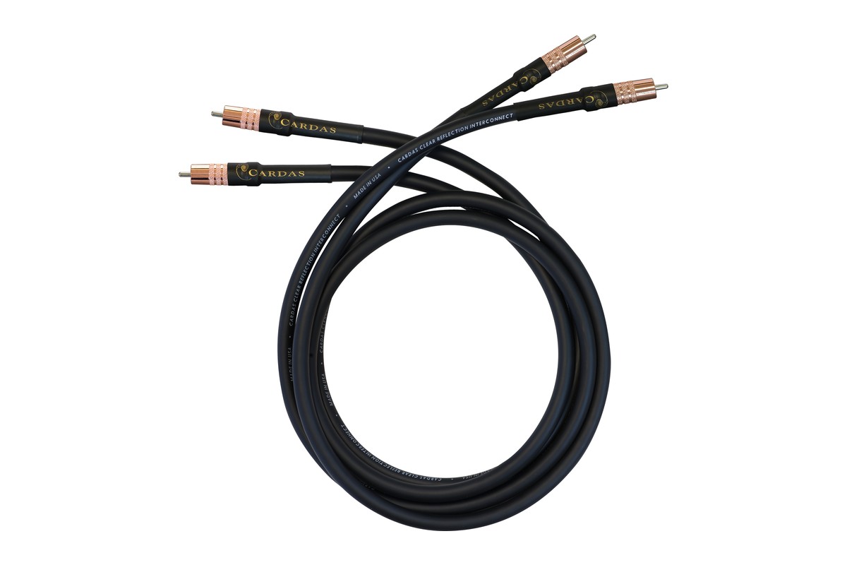 Second view of the pair of black cables with copper-coloured RCA plugs, laid in a loop