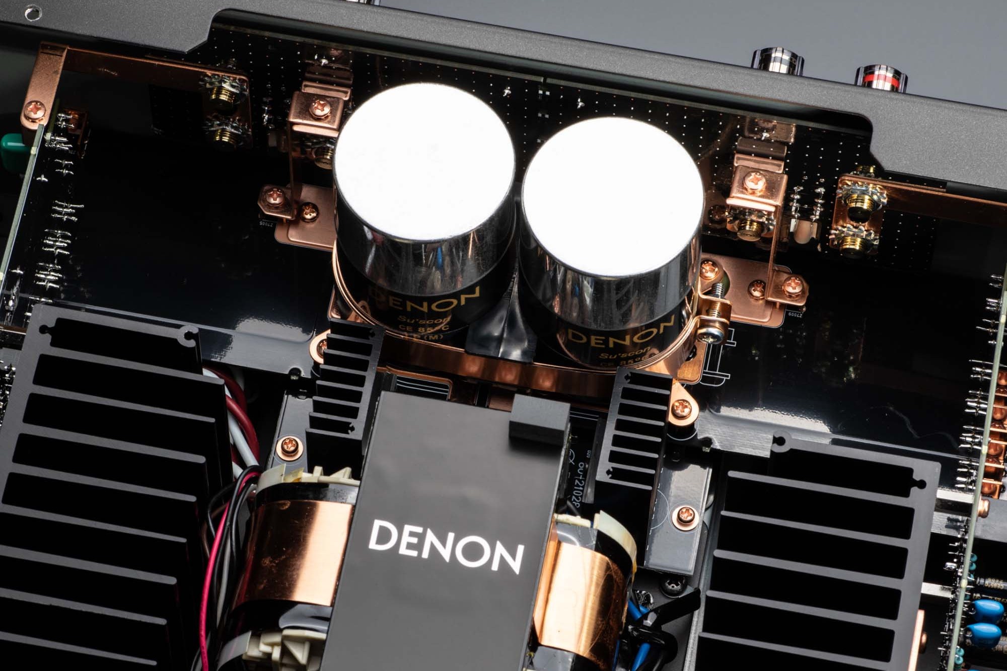 Interior close-up: filter capacitors and shielded transformer