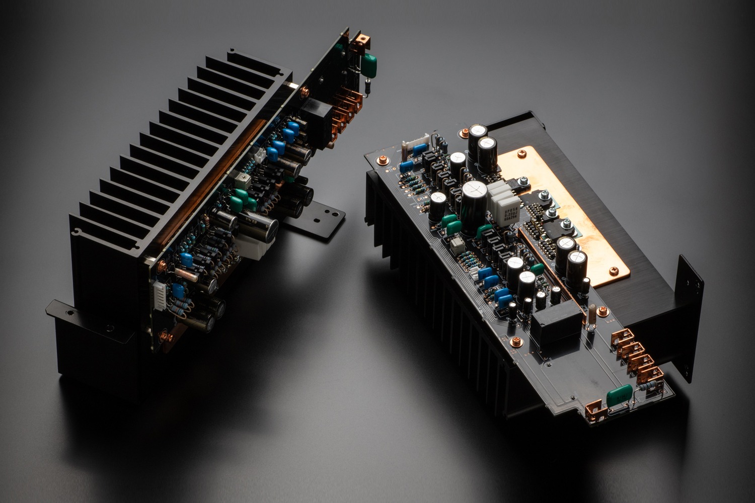 Amplifier modules removed from the chassis, heatsinks and circuit boards