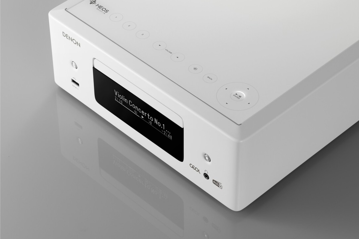 Close-up of the white receiver, display and touch controls on the top