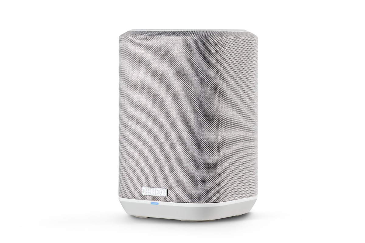 Compact white speaker, front view on a white background