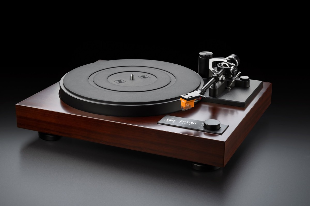 Dual CS 718Q turntable in walnut veneer, three-quarter view