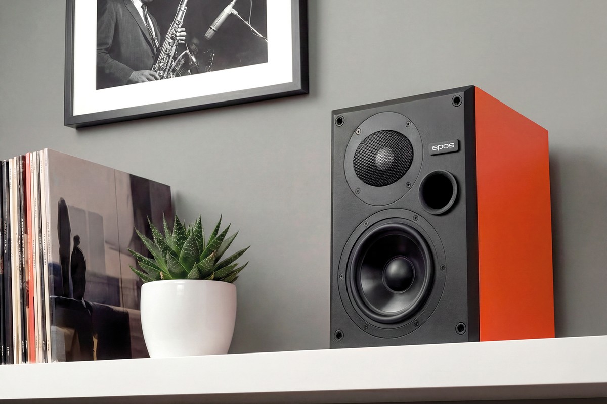 EPOS ES7N loudspeaker in orange on a wall shelf