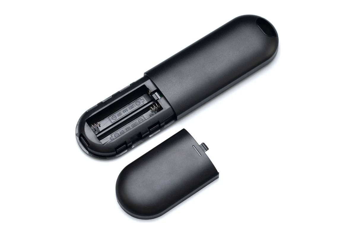 Open battery compartment with two AAA slots and its cover