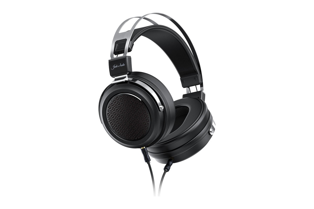 Black and silver headphones seen from three quarters, braided cable connected to the earcups
