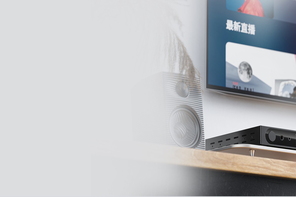 FiiO K19 sous un téléviseur mural dans un salon