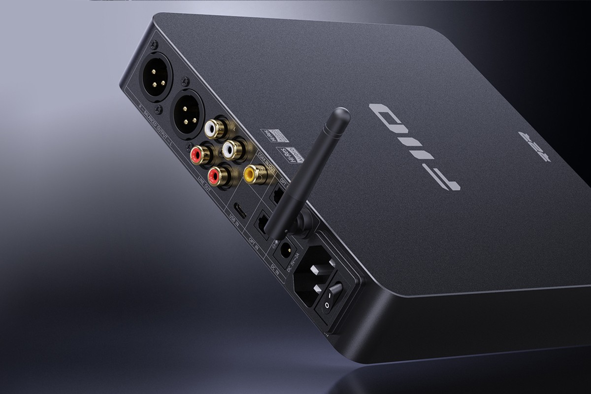 Rear panel: XLR and RCA outputs, coaxial and optical inputs, Bluetooth aerial