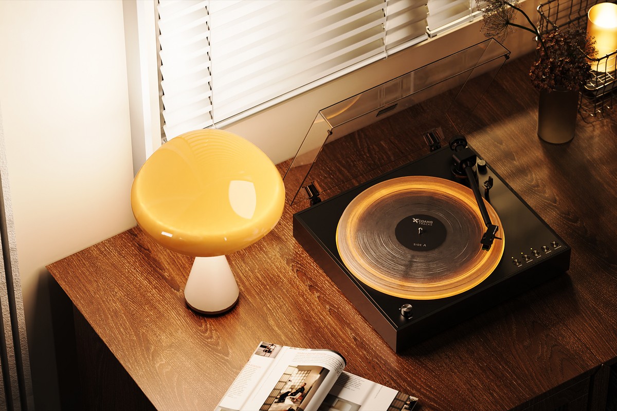 The deck on a wooden sideboard, beside a lamp
