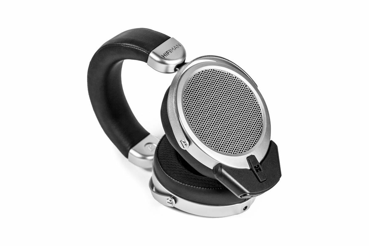Left ear cup fitted with the black Bluetooth module, angled view