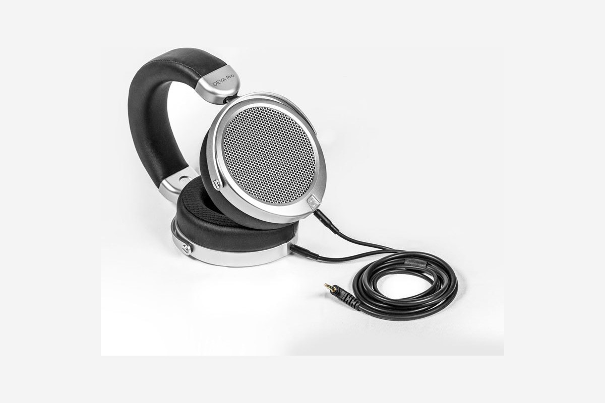 Headphones lying flat with their coiled jack cable