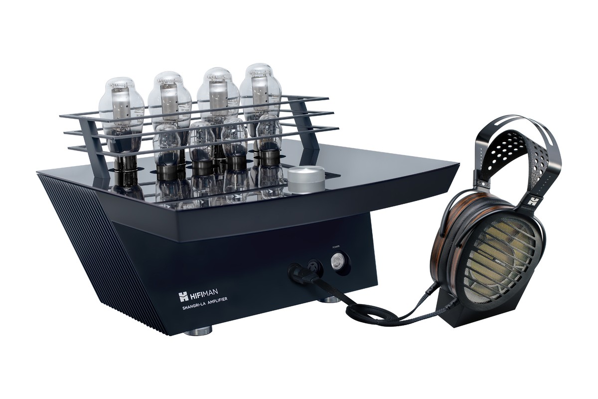 Black tube amplifier and wood-trimmed headphones side by side