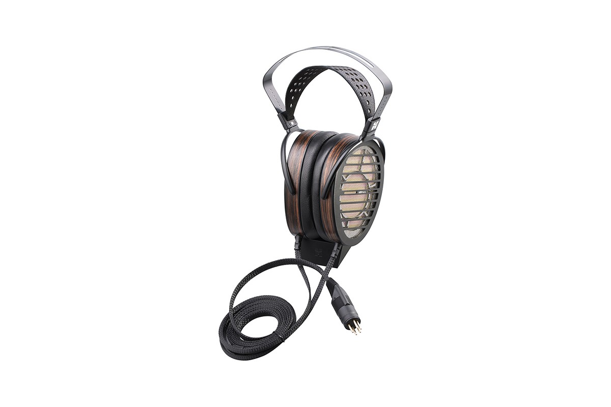Headphones seen from the front with their cable coiled below