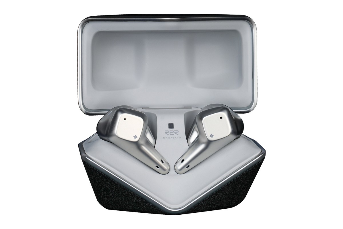 Open charging case with both earbuds in place
