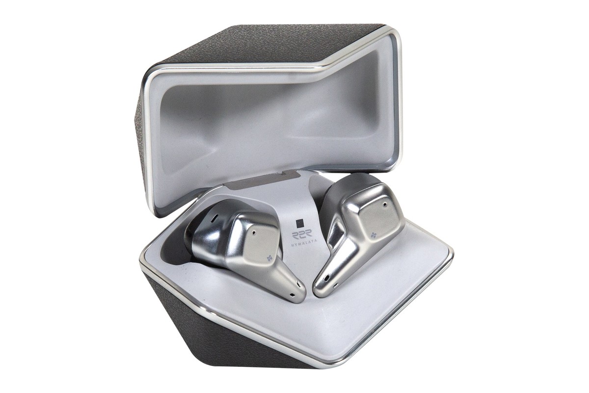 Charging case half open seen at an angle, earbuds visible