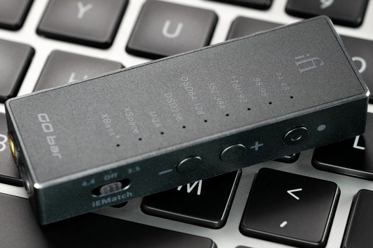 Top of the unit resting on a keyboard: indicator lights, volume buttons and iEMatch switch