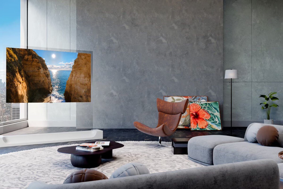 Écran Wallpaper fixé au mur au-dessus d'un meuble bas, sans câble apparent