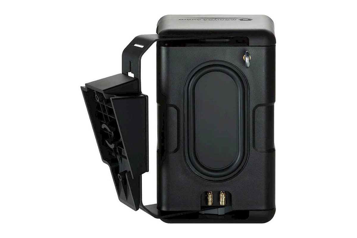 Rear panel of the black speaker with its terminals