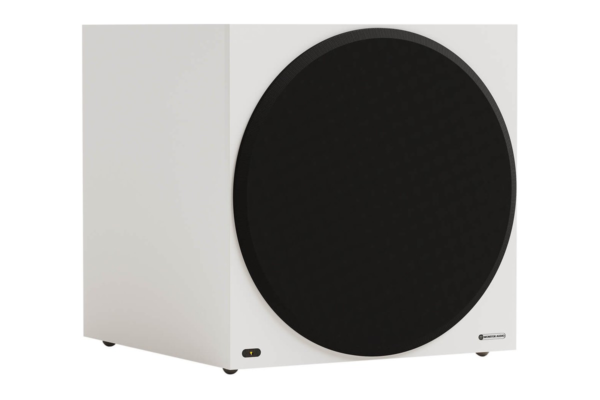 Matte white subwoofer, three-quarter view with grille