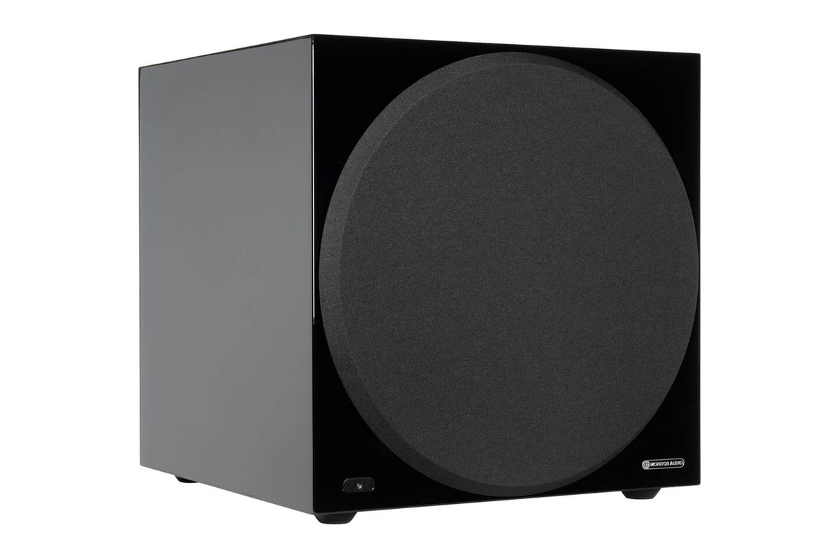 Gloss black subwoofer, three-quarter view with grille
