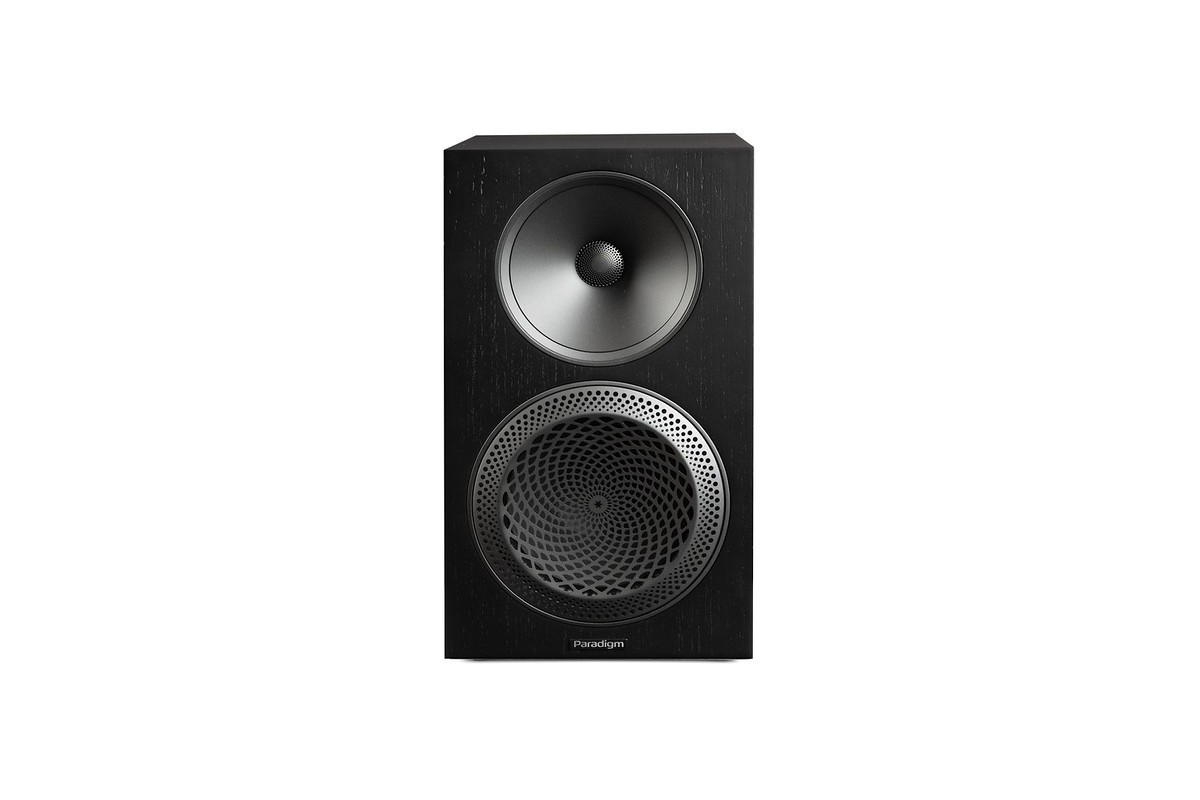 Black bookshelf speaker without grille seen from a three-quarter angle