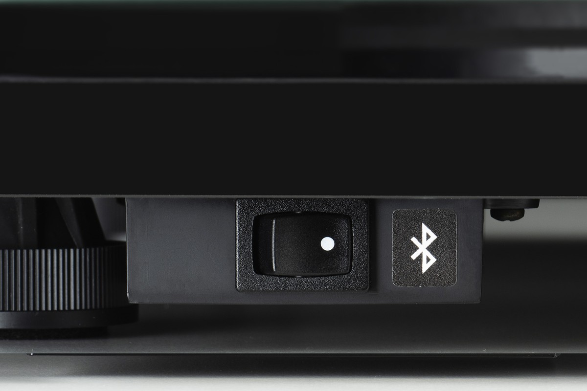 Bluetooth switch on the side of the turntable