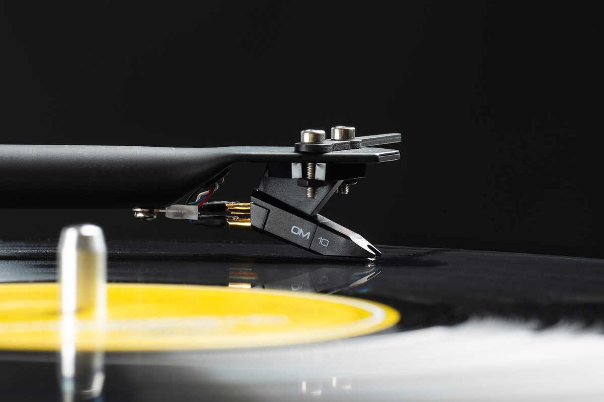 Cartridge resting on a yellow record