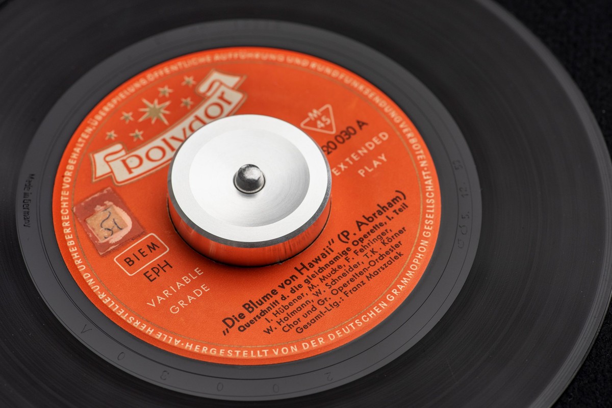 Silver adapter on a 7-inch single with an orange label