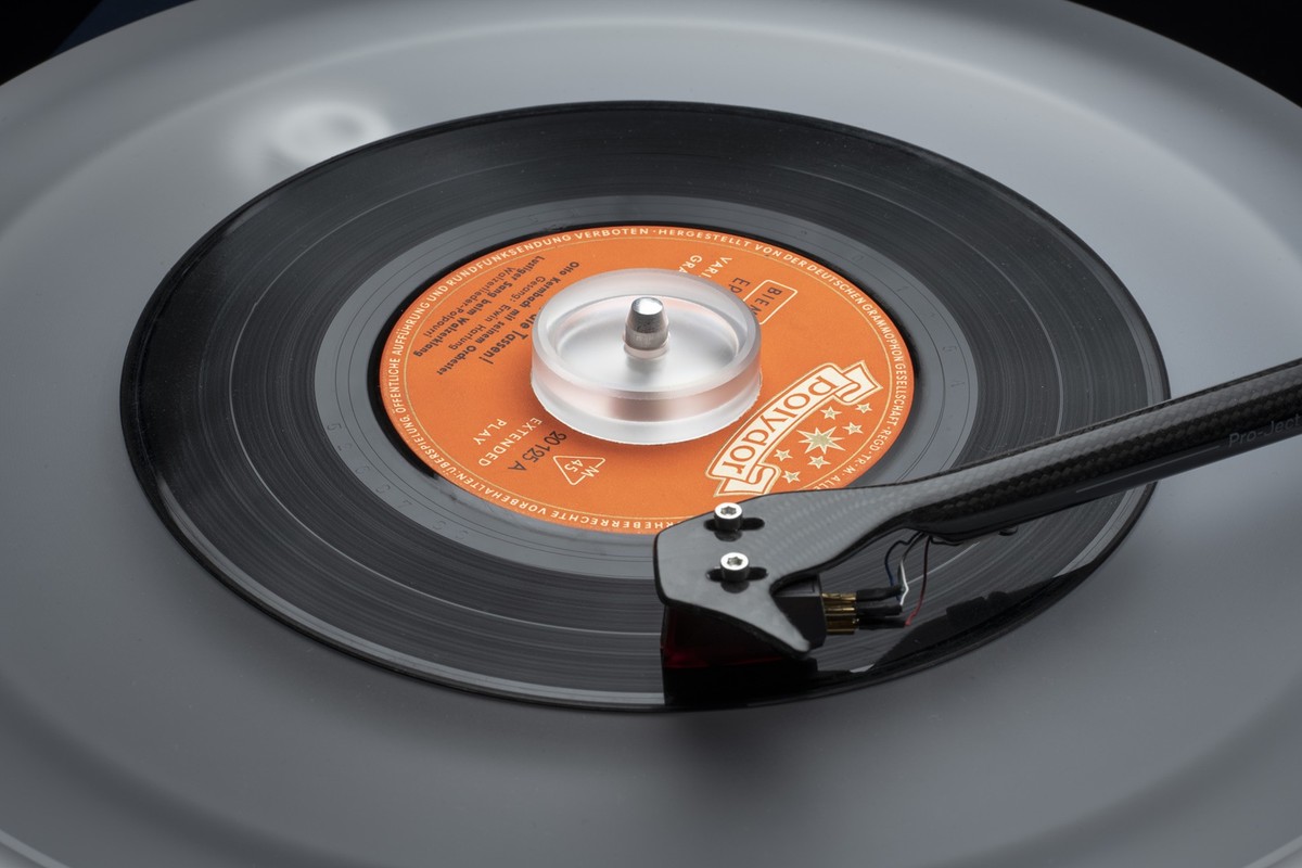 Clear adapter on a playing 7-inch single