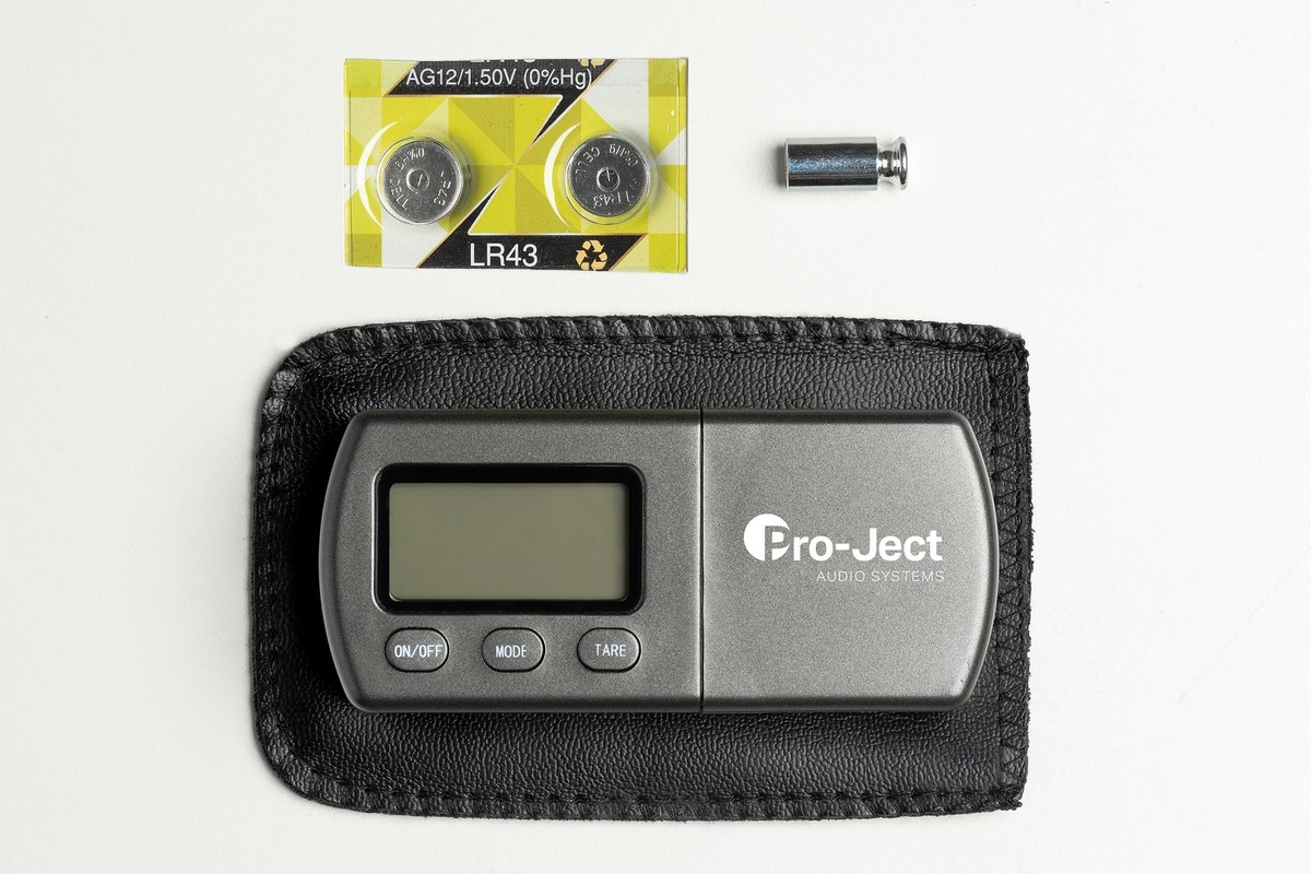 Scale in its pouch with spare batteries