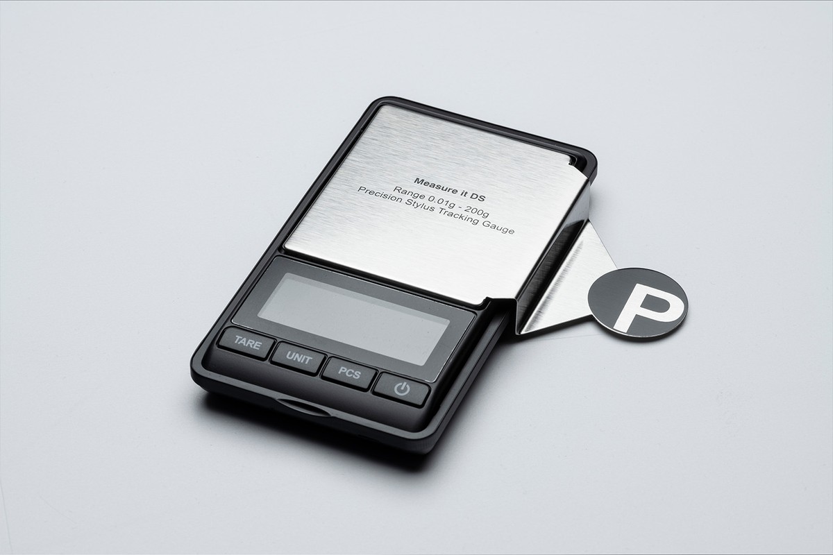 Black and stainless steel scale seen at an angle