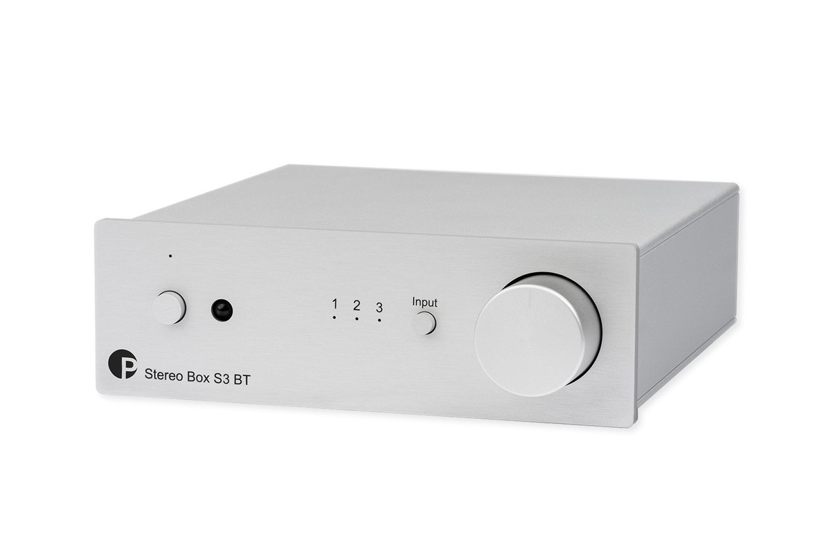 Amplificateur argent vu de face avec le bouton de volume
