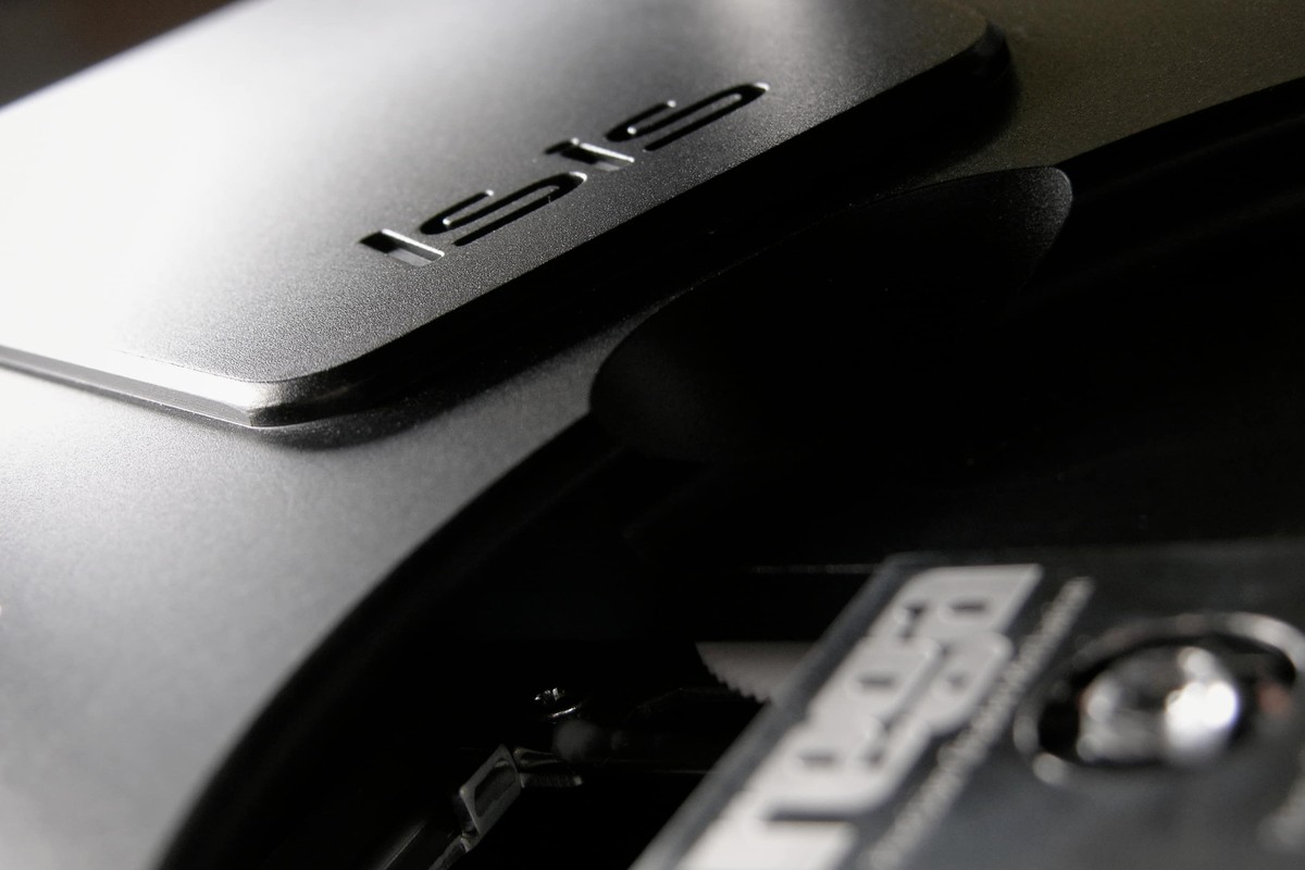 Detail of the machined aluminum cabinet and the engraving of the name