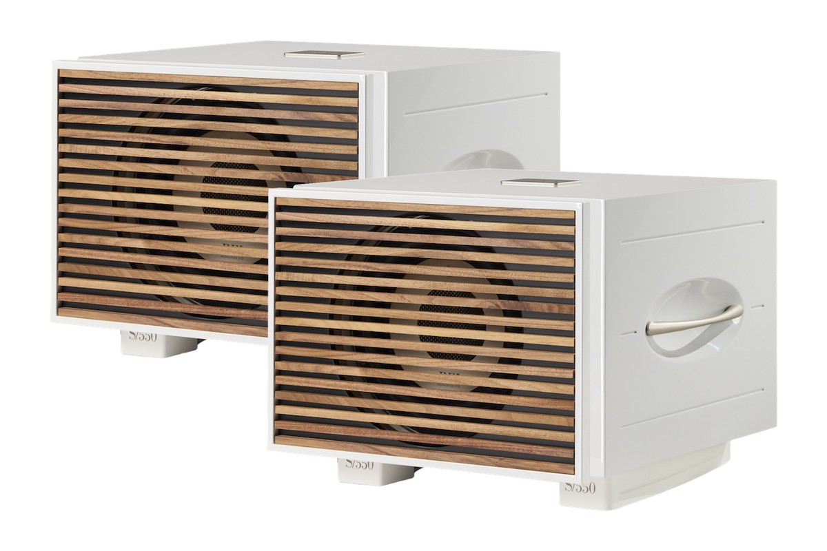 Two white subwoofers with wood-slatted fronts, three-quarter view