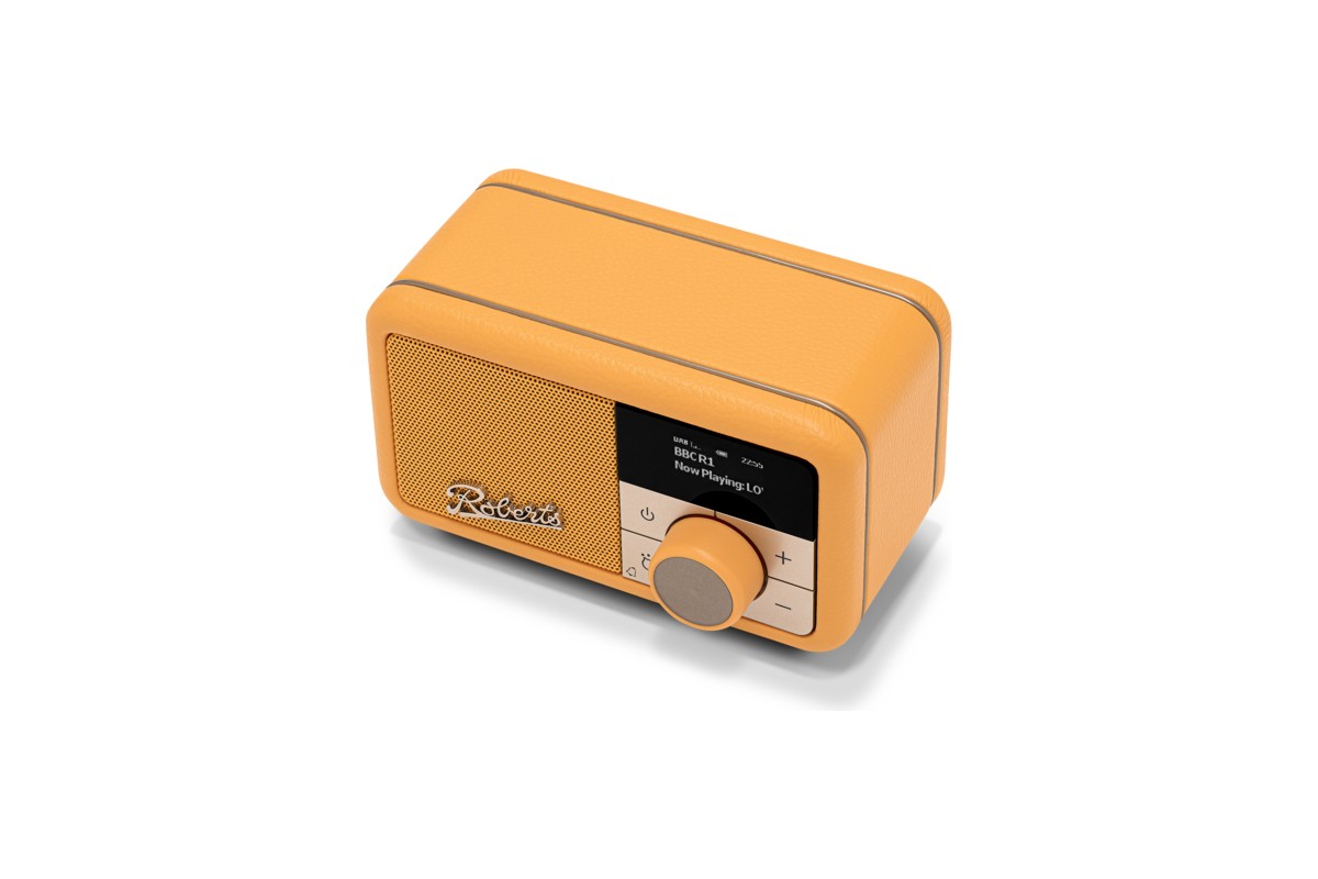 Radio rétro Sunburst Yellow vue de trois quarts en plongée sur fond blanc
