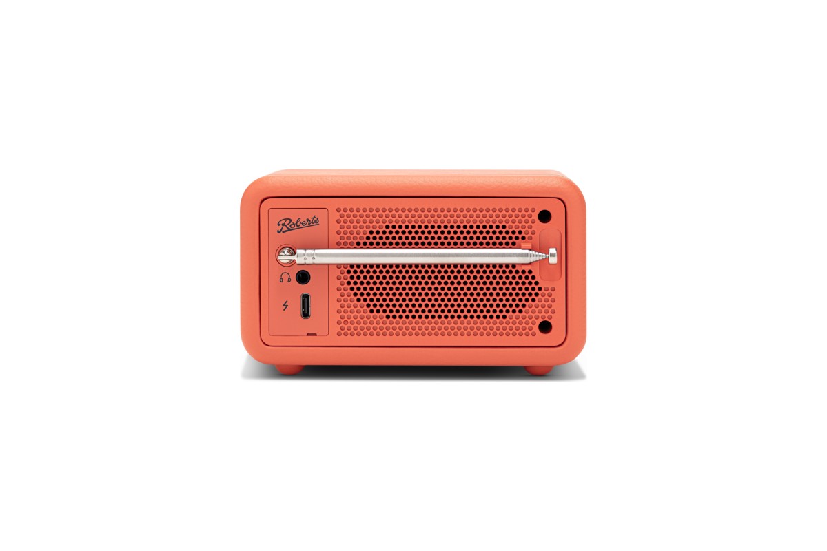 Retro della radio Pop Orange con antenna telescopica, presa cuffie e porta USB-C, sfondo bianco