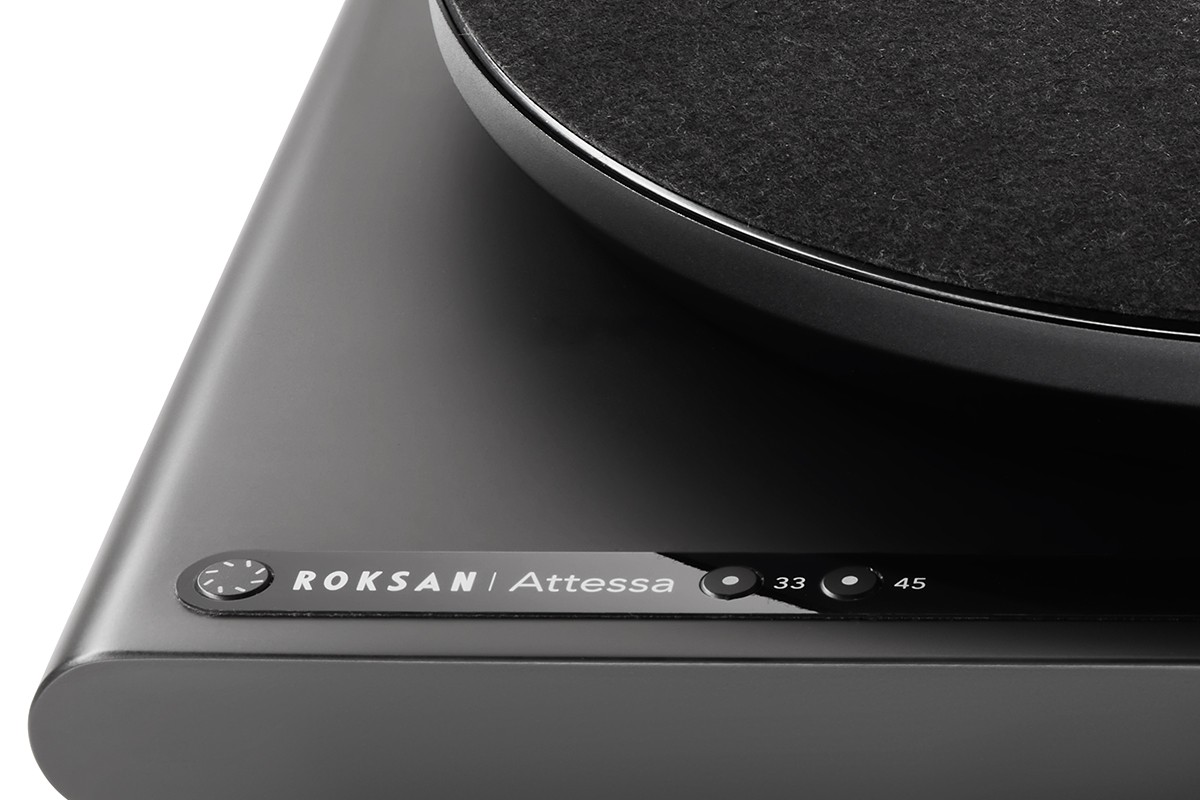 Corner of the black plinth with the Roksan Attessa logo and the 33 and 45 rpm buttons