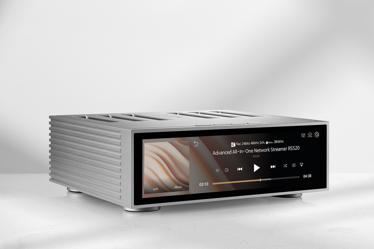 Silver streamer on a light surface with its playback screen lit