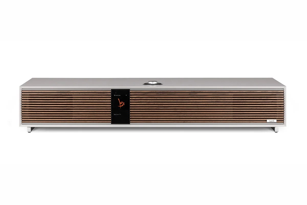 Soft Grey radiogram seen from the front on a white background, walnut grille, colour screen and RotoDial on top