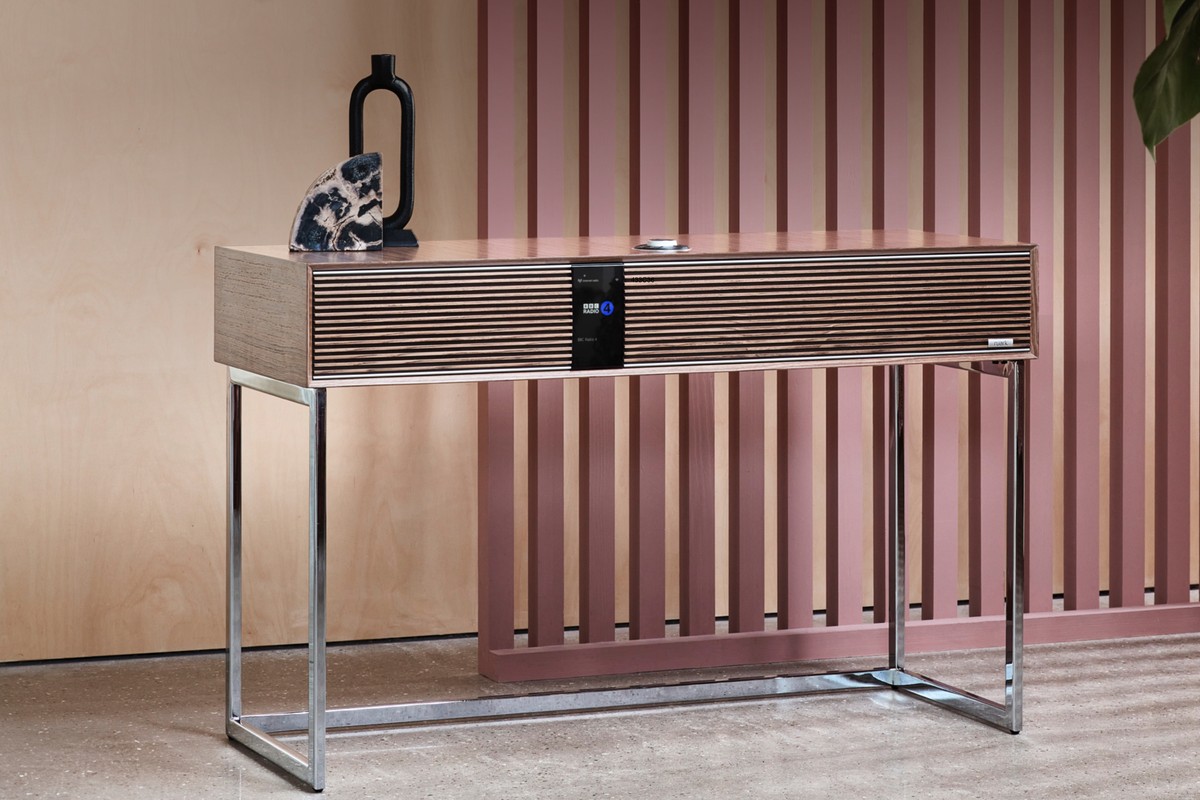 Ruark R810 Fused Walnut radiogram in front of a pink slatted wall and light wood