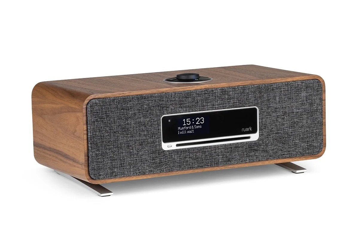 Compact system in walnut finish, three-quarter view on a white background