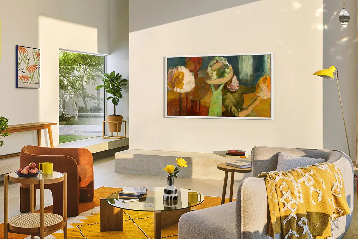 Samsung The Frame QE65LS03FA on a living-room wall showing an artwork