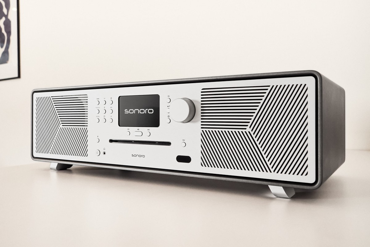 Graphite all-in-one system with a perforated silver front, on a light table